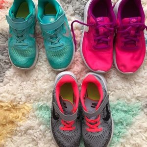 3 pairs of Girl Nike tennis shoes